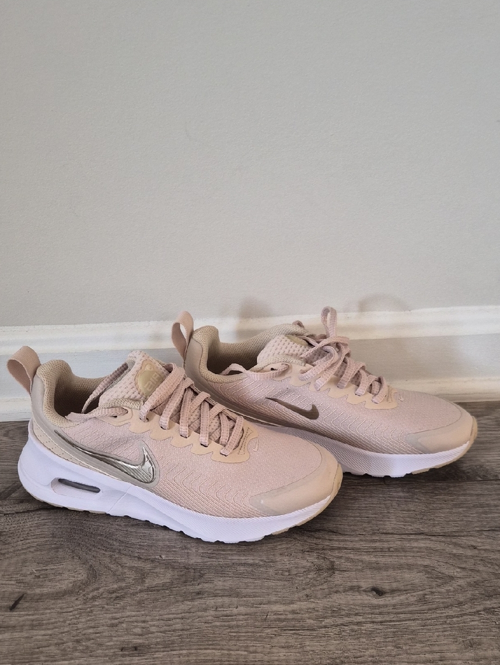Nike Women's Light Pink Mesh Sneakers with Metallic Swoosh